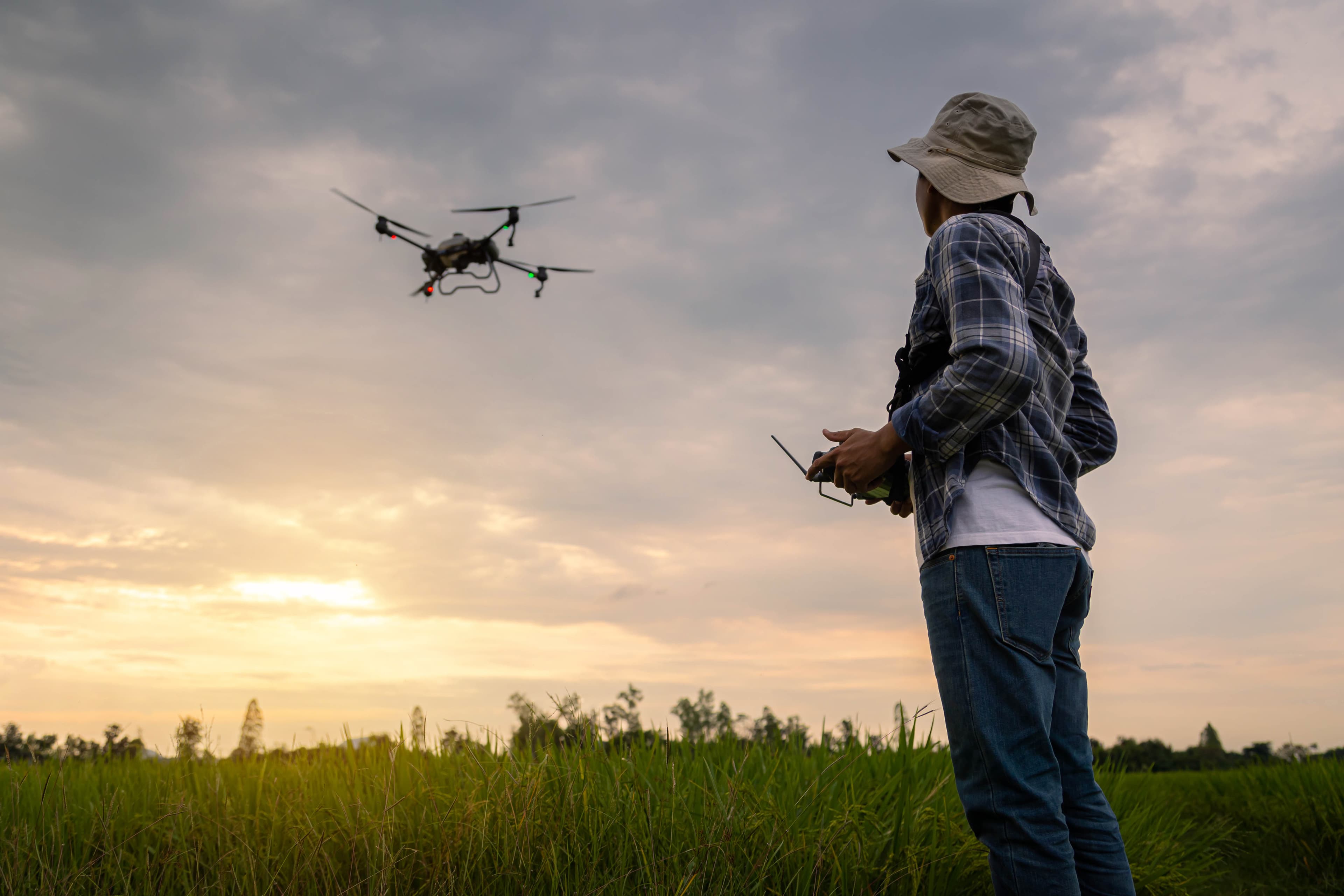 Drone in flight over a mapped terrain, representing advanced drone software capabilities.